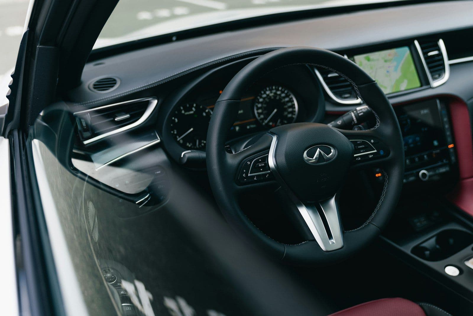 Modern car interior with leather seats and a touchscreen